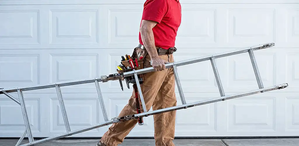 Garage door repair technician arriving with tools and ladder in Stamford, CT