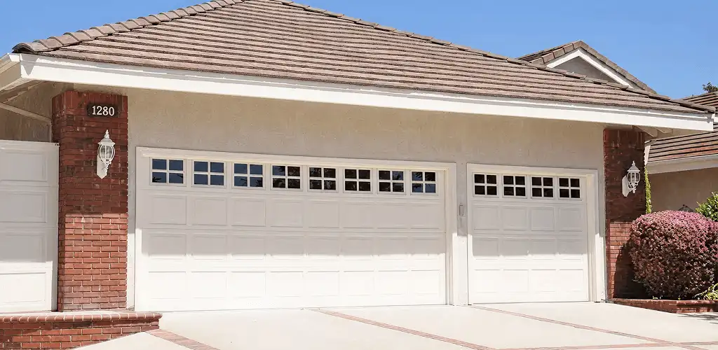 Residential garage door repair service for a double garage door in Stamford, CT