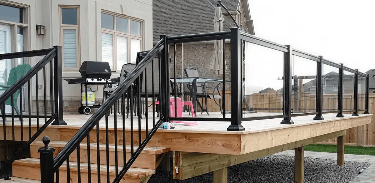 Handrail installation on a deck staircase for safety and code compliance in Stamford, CT