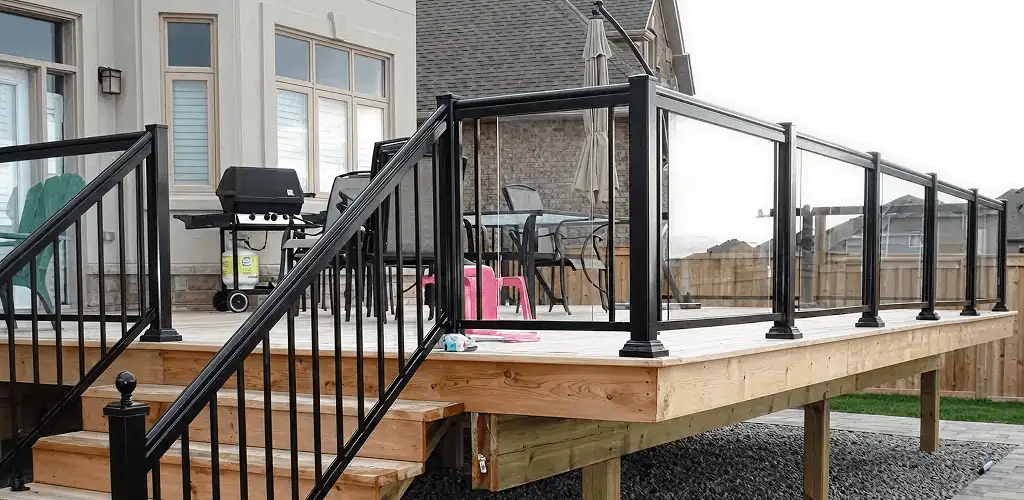 Handrail installation on a deck staircase for safety and code compliance in Stamford, CT